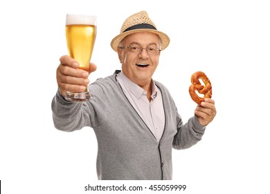 Mature Man Holding A Pint Of Beer And A Pretzel Isolated On White Background