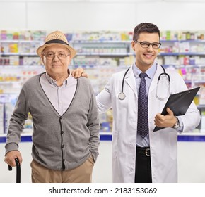 Mature Man And A Phamracist Standing In A Chemist Store