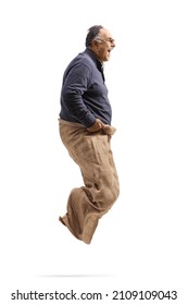 Mature Man Playing A Potato Sack Race Isolated On White Background