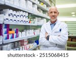 Mature man, portrait and arms crossed at pharmacy, manager and confident chemist. Male person, pharmacist and proud of medication treatment at apothecary, expert service and store aisle in England