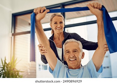 Mature, man and portrait with resistance band or woman physiotherapist for physical therapy, mobility exercise and arthritis management. Geriatric physiotherapy, stretching arm and rehabilitation. - Powered by Shutterstock