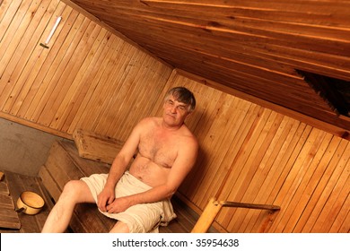 The Mature Man Poses In A Sauna