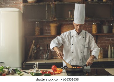  Mature Man Professional Chef Cooking Meal Indoors