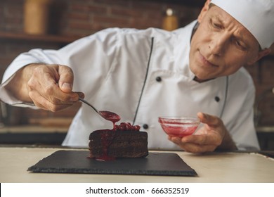  Mature Man Professional Chef Cooking Meal Indoors