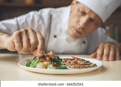  Mature Man Professional Chef Cooking Meal Indoors