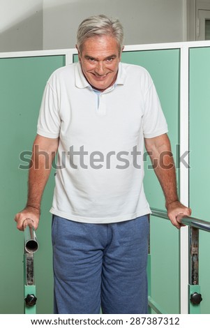 Mature man rehabilitating his legs