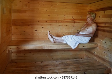 Mature Man Relaxing In Sauna