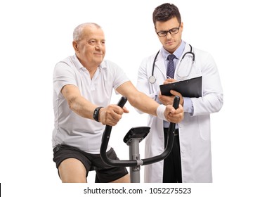 Mature man riding an exercise bike and a doctor writing in a clipboard isolated on white background - Powered by Shutterstock