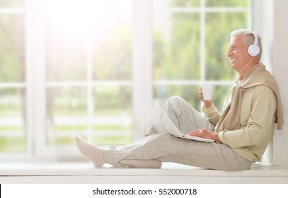 Mature Man Sitting On Window Sit 