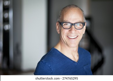 Mature Man Smiling At The Camera