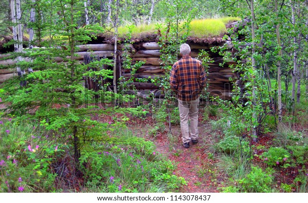 Mature Man Stands Front Ramshackle Trappers Stock Photo Edit Now