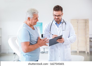 Mature Man Visiting Urologist In Clinic