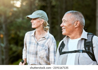 Mature Man And Woman Hiking, Smiling And Looking At The View In Nature. Fit Local Travel Guide Showing An Active Female Tourist The Natural Landscapes While Walking A Trail Outdoors In The