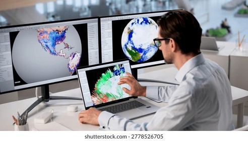 Mature Meteorologist Analyzes Computer Data To Predict Storm And Climate Changes.