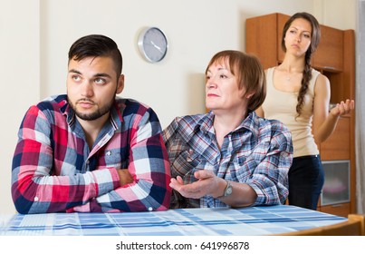 Mature Mother Having Conflict With Their Unhappy Children