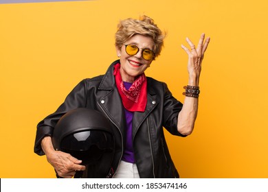 Mature Old Beautiful Woman Feeling Happy, Surprised And Cheerful, Smiling With Positive Attitude, Realizing A Solution Or Idea. Motorbike Concept