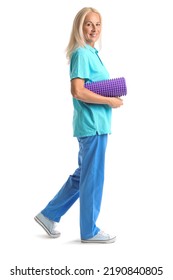 Mature Physiotherapist With Foam Roller On White Background