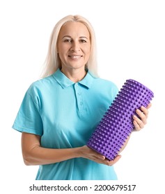 Mature Physiotherapist With Foam Roller On White Background