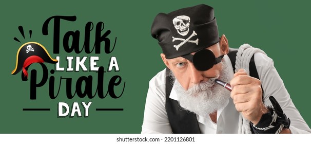 Mature pirate with smoking pipe on green background. Talk Like a Pirate Day