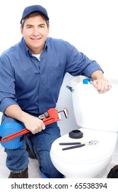 Mature Plumber Near A Flush Toilet