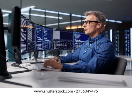 The Mature Programmer Is Developing Cyber Security Software For Businesses