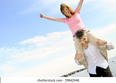 Mature Romantic Couple Of Baby Boomers Enjoying Outdoors