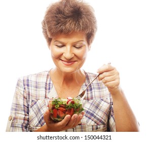 Mature Smiling Woman Eating Salad