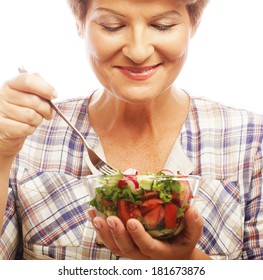 Mature Smiling Woman Eating Salad