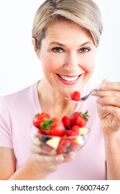 Mature Smiling Woman  Eating Salad,  Fruits And Vegetables.