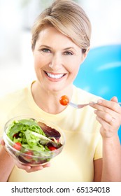 Mature Smiling Woman  With Fruits And Vegetables.