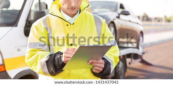 Mature Tow Truck Driver Making Reports Stock Photo Edit Now