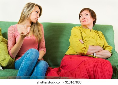 Mature Woman With Adult Daughter Sharing Bad News At Home