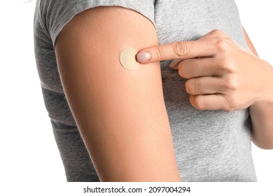 Mature Woman With Applied Nicotine Patch On White Background, Closeup. Smoking Cessation