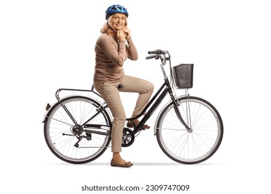 Mature woman with a bicycle putting on a helmet isolated on white background - Powered by Shutterstock
