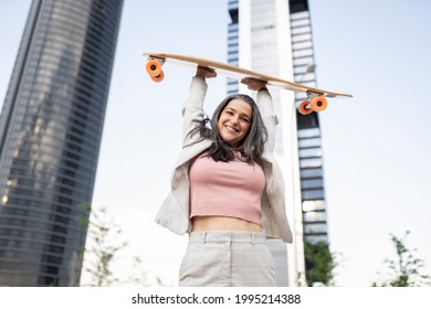 Mature Woman, Businesswoman With Skateboard Happy In Town