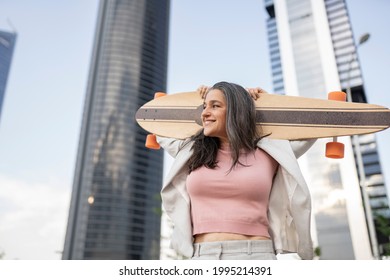 Mature Woman, Businesswoman With Skateboard Happy In Town