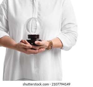 Mature Woman With Crystal Ball On White Background