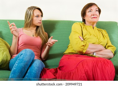 Mature Woman With Daughter Sharing Bad News At Home