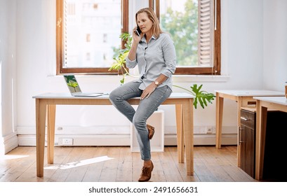 Mature woman, designer and office with phone call, planning or discussion with idea for project. Web creative, business owner and communication with smartphone, entrepreneur and company negotiation - Powered by Shutterstock