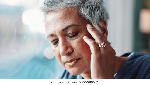 Mature woman, doctor and headache at hospital window with burnout, medical fail and stress in lobby. Frustrated physician, health worker and grief from loss, migraine and healthcare mistake in clinic - Powered by Shutterstock