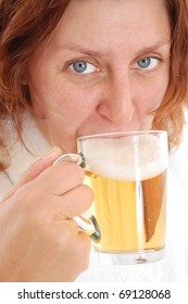 Mature Woman Drinking Beer. Isolated Over White.