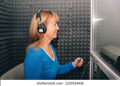 Mature Woman During Audiometry, Hearing Test At Audiologist Office