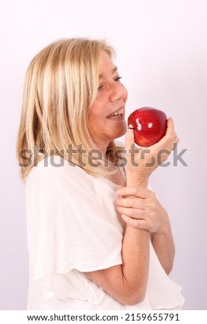 Similar – A hungry woman looks in the fridge