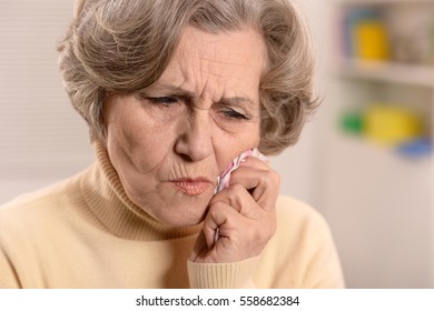 Mature Woman Have A Toothache