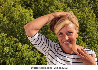 Mature Woman Having A Hot Flash - Close Up