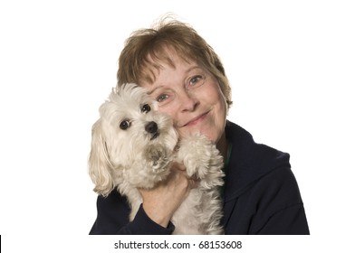 Mature Woman With Her Puppy (Maltipoo) On White Background