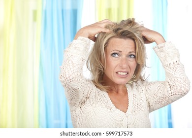 Mature Woman With Itchy And Dry Scalp