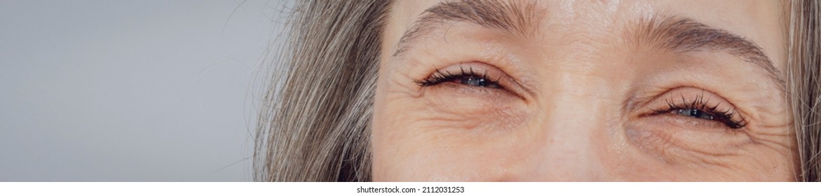 Mature Woman Laughing Eyes Close-up Detail Shot