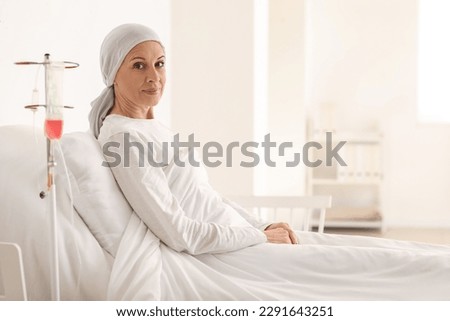 Mature woman lying in clinic