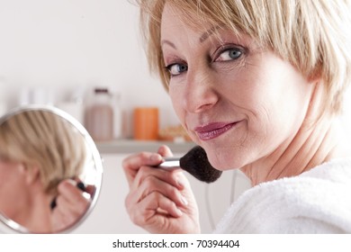 Mature Woman Making Up